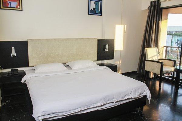 Hotel Aristro Lonavala Kamer foto